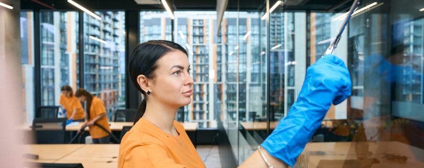 Qualified employees of the cleaning company clean and disinfect all surfaces in the coworking space