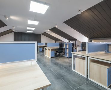 interior in empty work mansard room in modern office or coworking