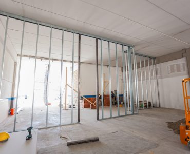 Refurbishment of a large industrial building. The construction site in the phase of remaking of the systems and walls in masonry and plasterboard.